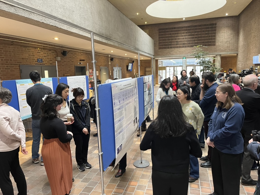 Attendees at Research Showcase Poster Presentations.