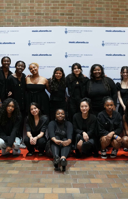 Future Sound 6 participants pose in group shot on red carpet