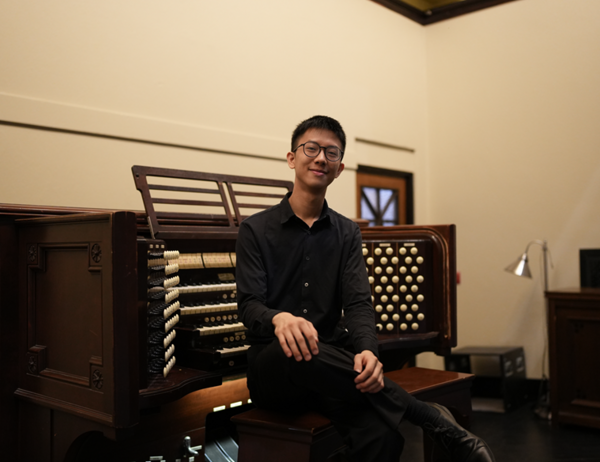 Emmanuel Wong at the organ in U of T's Convocation Hall