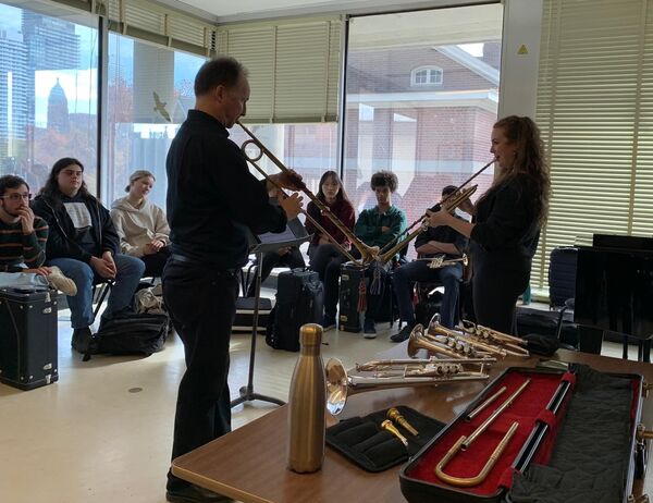Olivia Callahan receives instruction on playing Baroque trumpet in a master class.