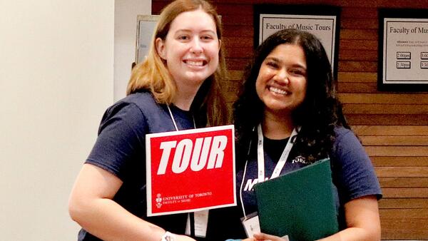 Thumbnail Image for Two smiling tour guides.