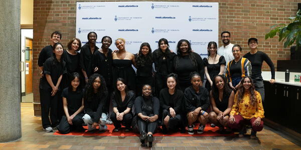 Future Sound 6 participants pose in group shot on red carpet