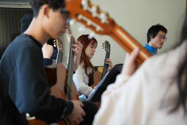 Thumbnail Image for group of students performing on classical guitar