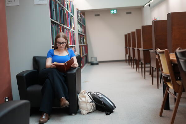 Thumbnail Image for A student reading in the Music Library