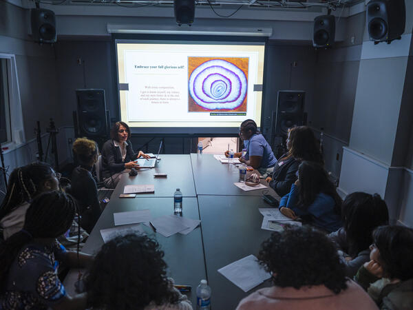 Project Coordinator, Parisa Sabet, sits with Future Sound 6 participants.