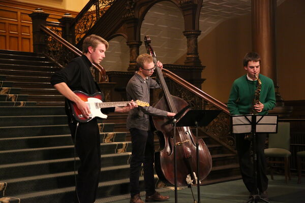 Jazz Trio with guitar, double bass, and saxophone