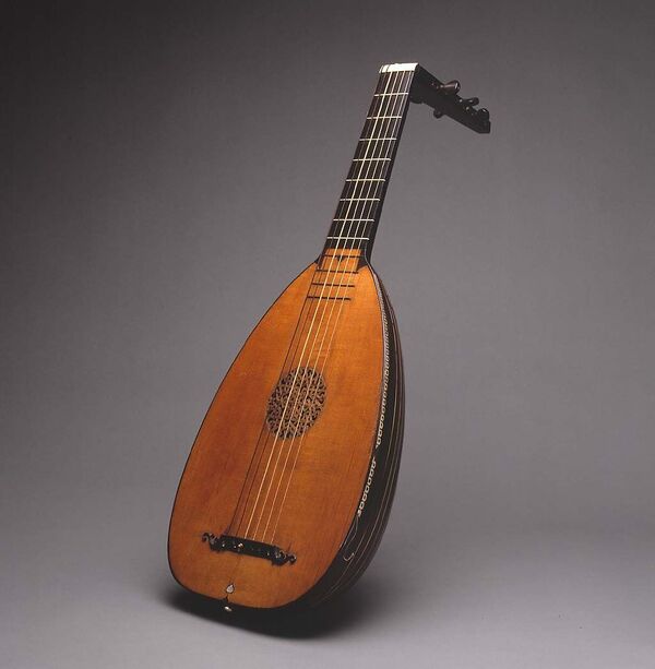 Image of a lute with a gray background.