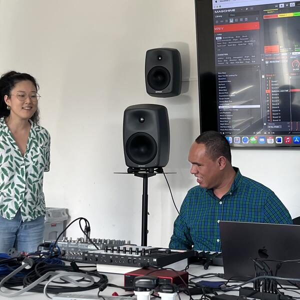Jay making music with graduate student